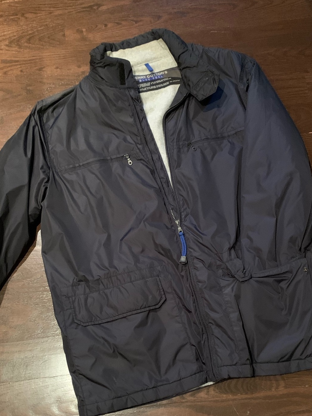 Henry Cotton's men’s Navy Windbreaker lightly padded jacket with Zip Pockets